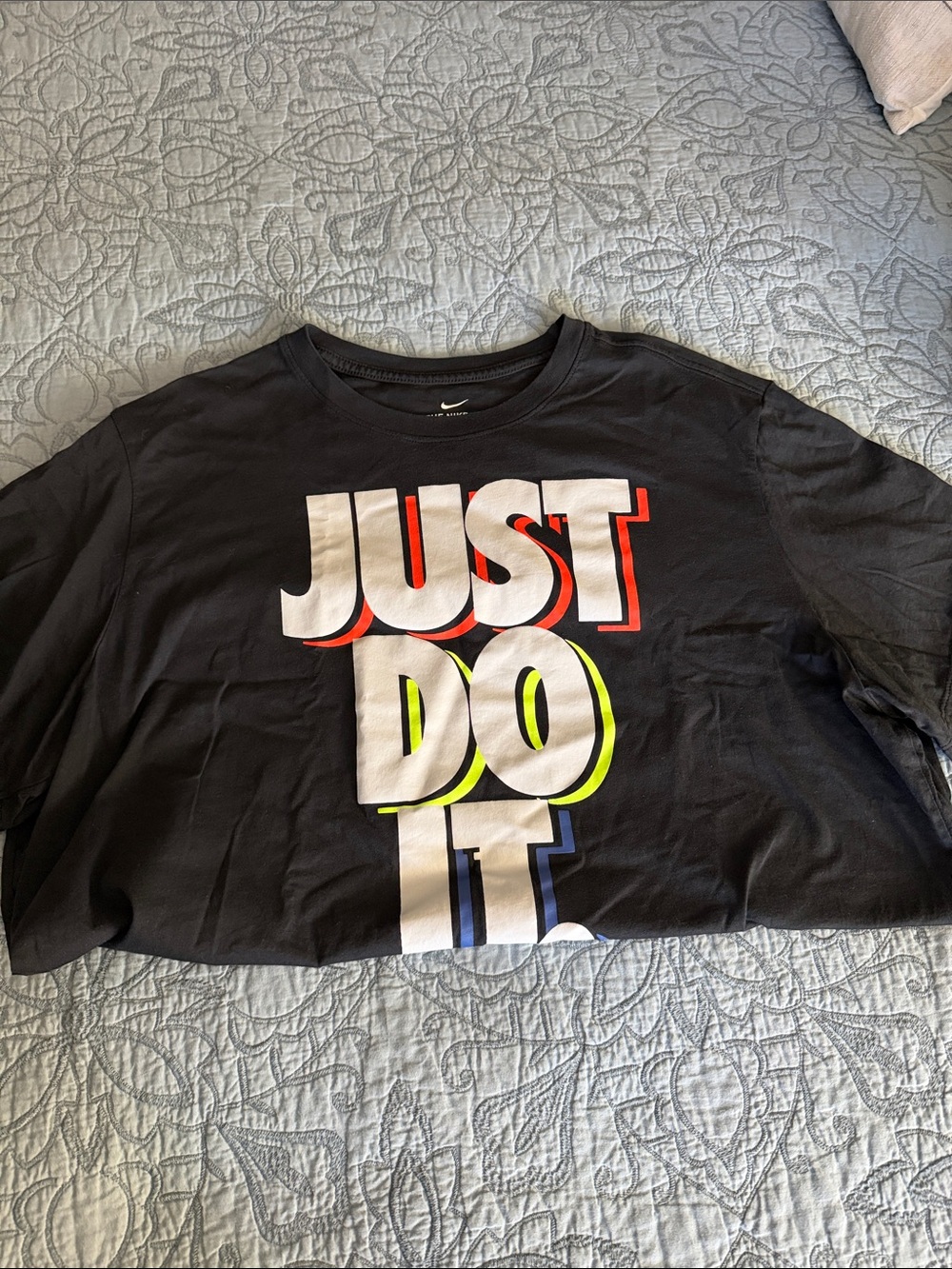 PREOWNED Nike Black Short Sleeve Tee with Multicolor 'Just Do It' Graphic
